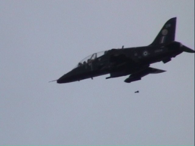 Hawk dropping a practice bomb on target 5